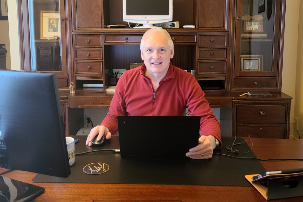 Ernie St. Gelais at his desk in Colorado Springs